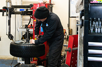 Technician working on a wheel